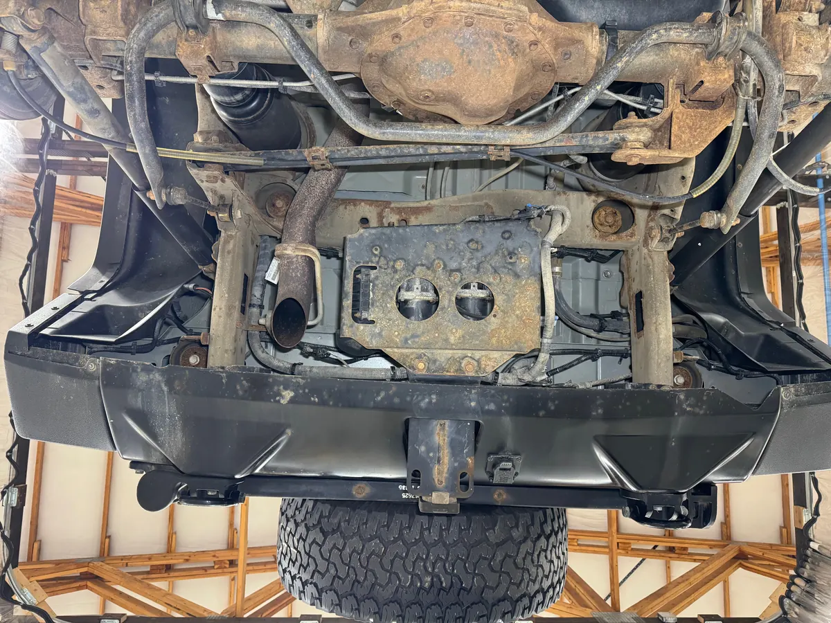 Hummer H2 rear axle, hitch and rear frame section before cleaning